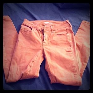 Salmon pink skinny jeans